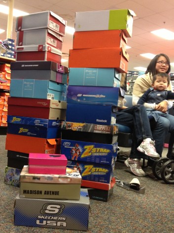 Our growing pile of new shoes at Shoe Carnival