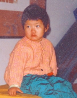 Meghan, waiting in her orphanage for a family she was regularly told would never come for her